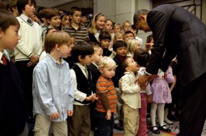 There he goes again! One wonders if the U.S. right-wing will lambast President Obama for what appears to be a bow to a child of U.S. Embassy workers in Tokyo. (Official White House Photo by Pete Souza)