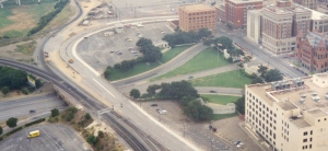 Dealey Plaza, Dallas. Grassy Knoll, Texas School Book Depository, top right. Wikimedia Commons