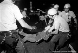 Chicago police drag  student protesters away during the 1968 melee during the Democratic  Party convention.